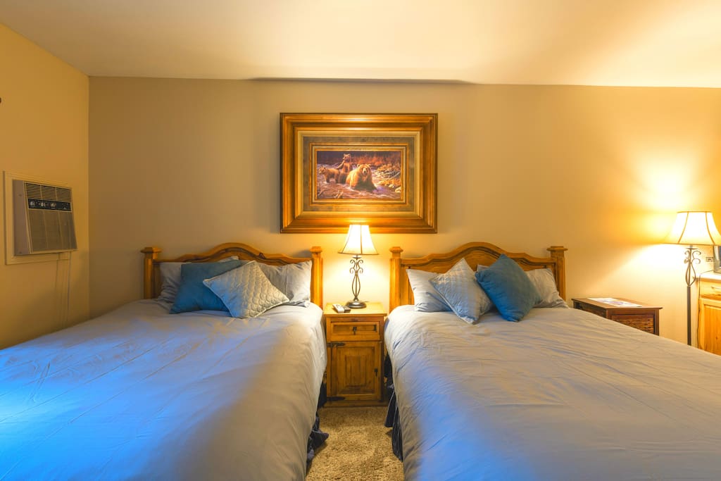 2 Queen beds and 2 nightstands