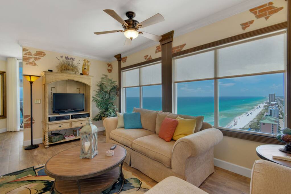 This corner condo has the most breathtaking views on the beach with a wall of windows