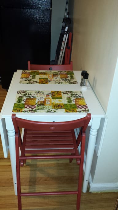 cozy breakfast nook. table can seat up to 6 people when opened up.