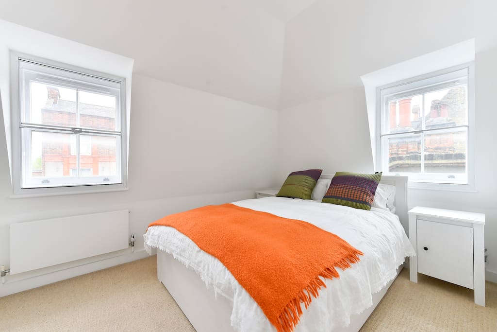 The Master bedroom has a large comfy double bed with light baring windows and plenty of cupboard space.