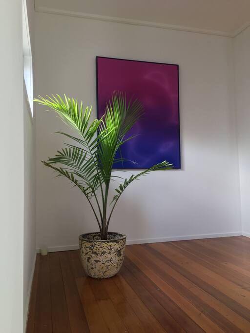 Landing area towards kitchen. Artwork: James L Marshall, Los Angeles