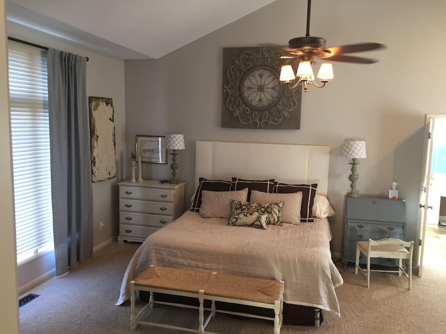 Master Bedroom with King Size Bed and walk out to patio.