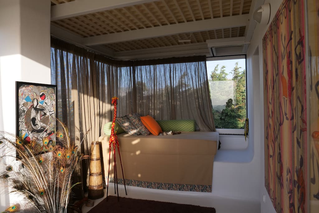 This is one of the two balconies at the second floor room and is protected with panoramic glass windows. Night time if you decide to sleep at that balcony you will enjoy watching the stars and the fresh breeze .