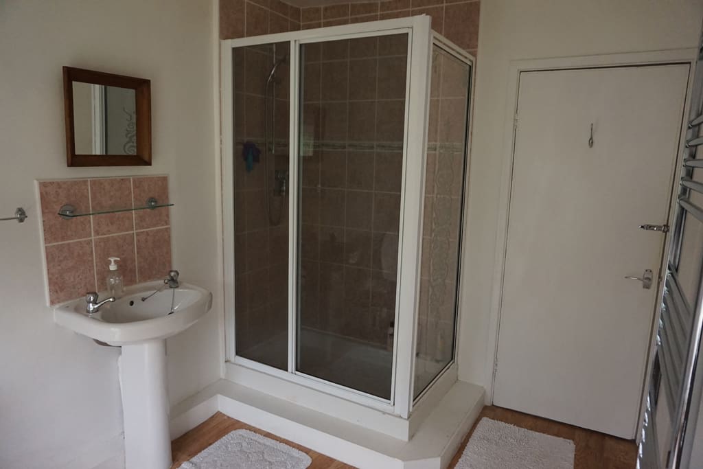 Bathroom has a shower