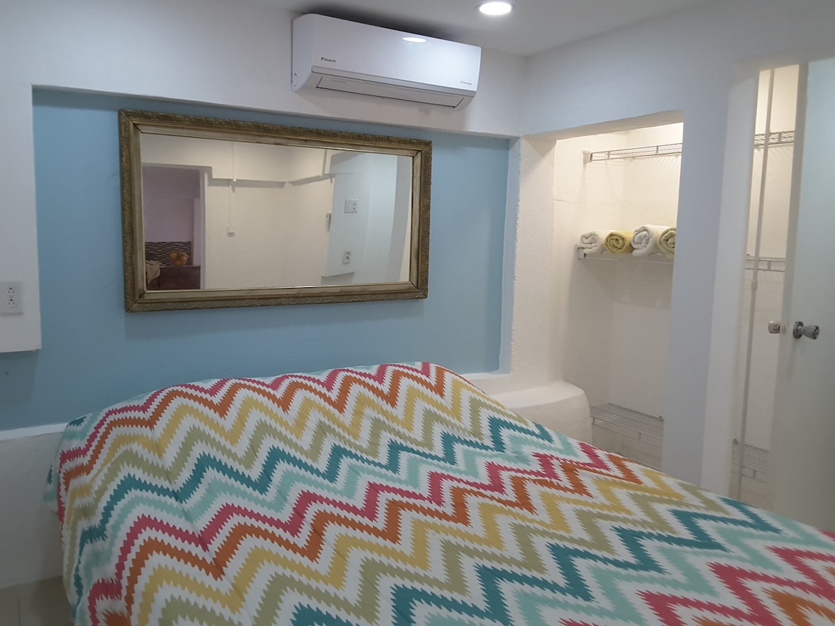 Cozy bedroom with comfortable queen bed