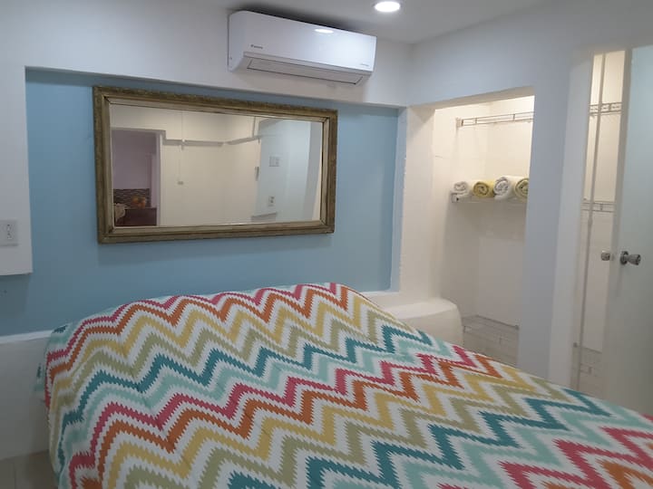 Cozy bedroom with comfortable queen bed