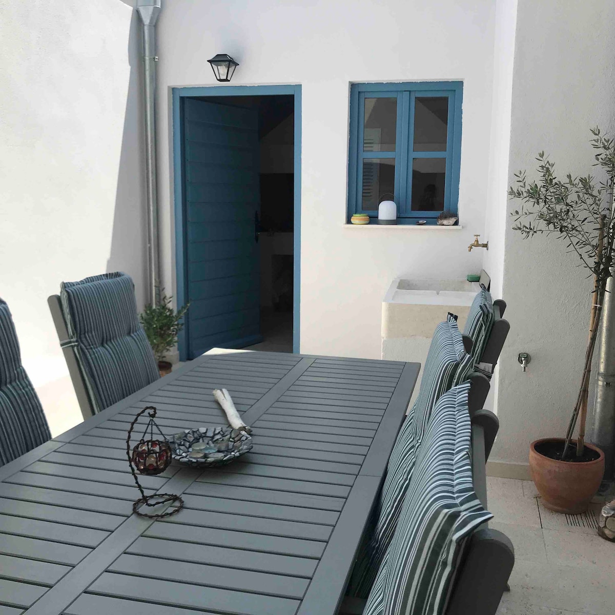 Backyard image 2 at Apartment Festini – Spacious apartment in central Pag in Pag