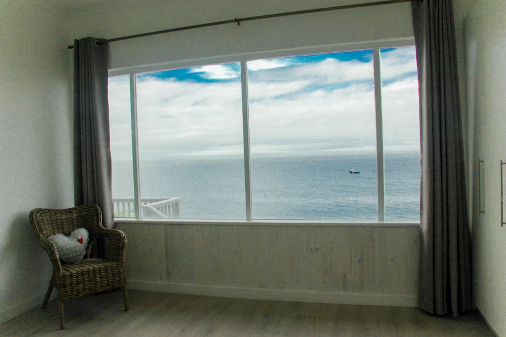 sea and cloud view from your bed - watch the whales from your bed if you are lucky!