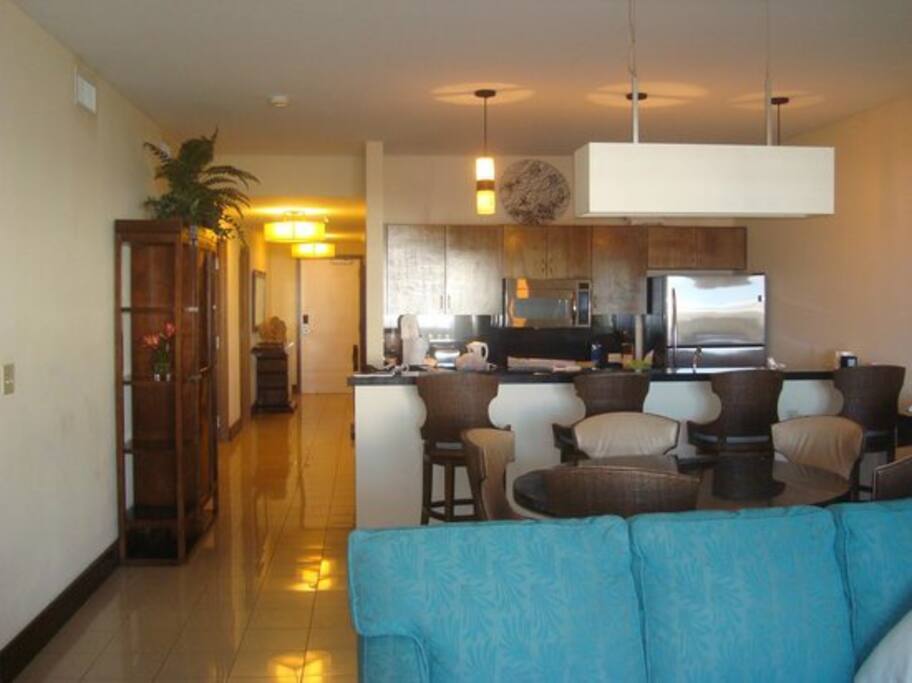Living room, dining area and kitchen