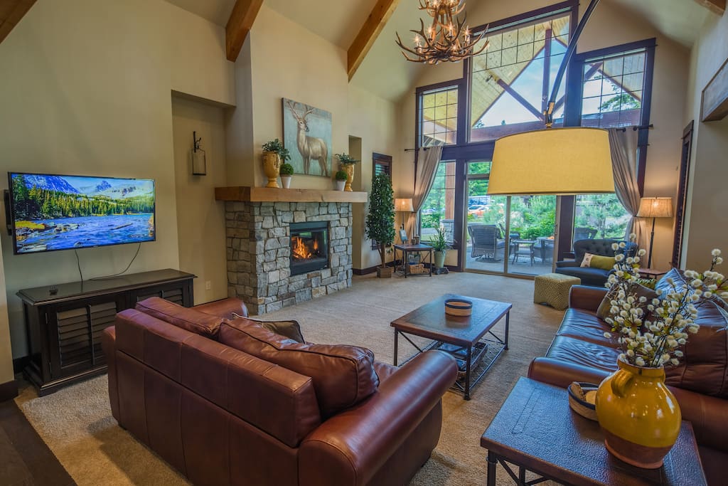 Fabulous great room with a gas fireplace and large TV.
