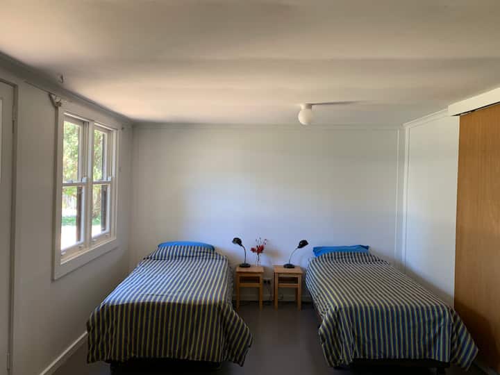 The large second bedroom has 4 singles