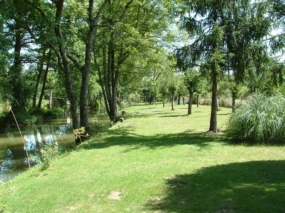 View of rear garden of Mill House showing river