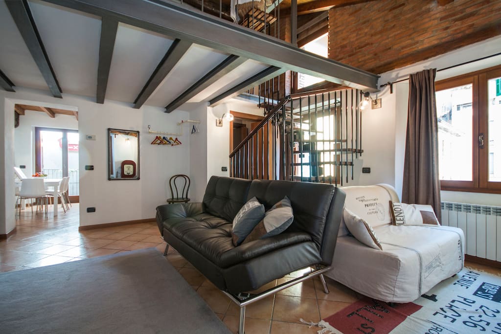 pic by Airbnb - living and kitchen are separated