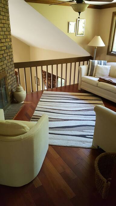 loft room with sofas for relaxing.