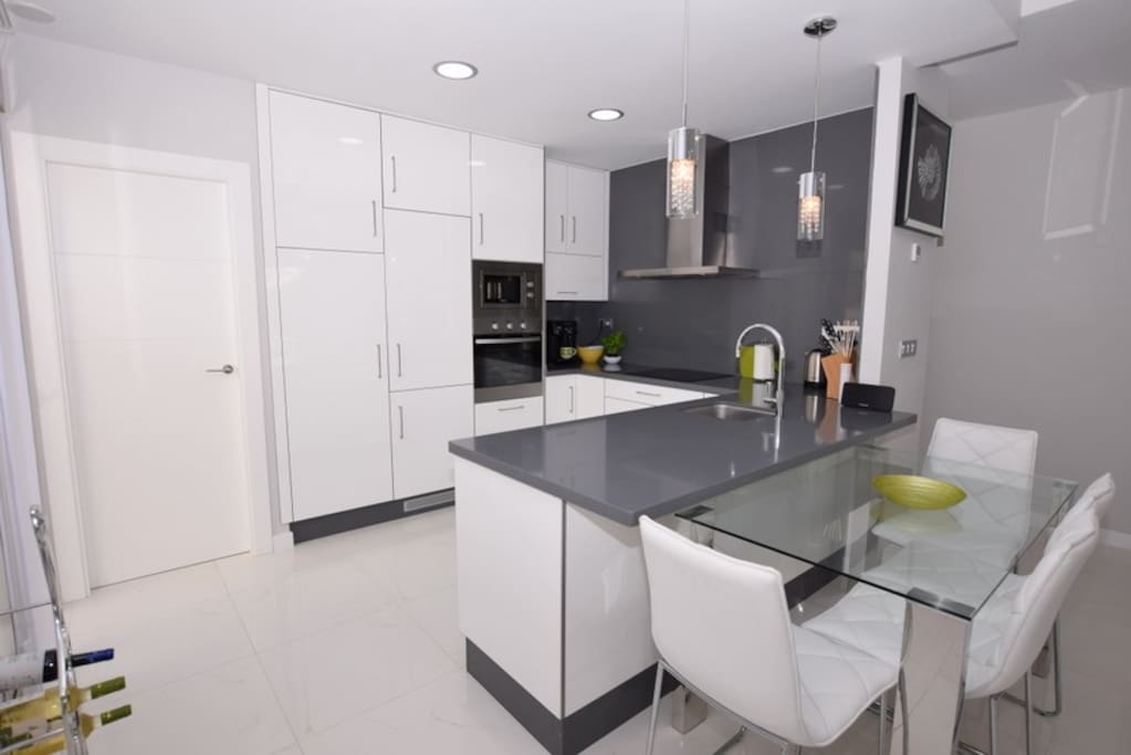 Fully equipped kitchen including oven/hob/microwave/dishwasher/washing machine