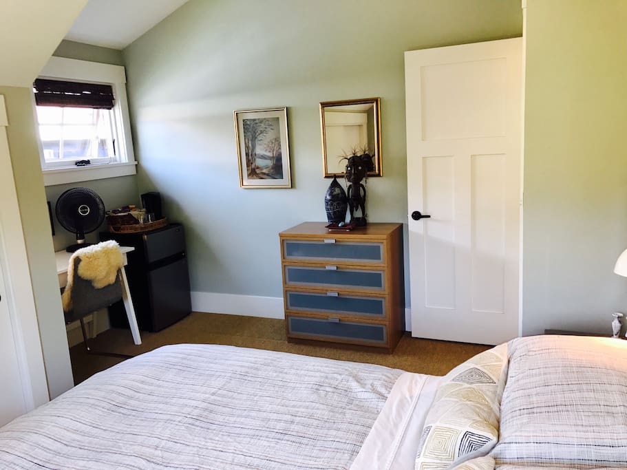 Room includes dresser, desk and mini fridge for your use
