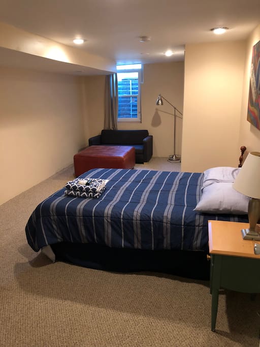 Large window and closet with pull out futon couch