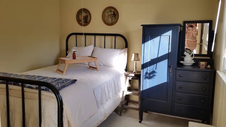 Back bedroom , different spread