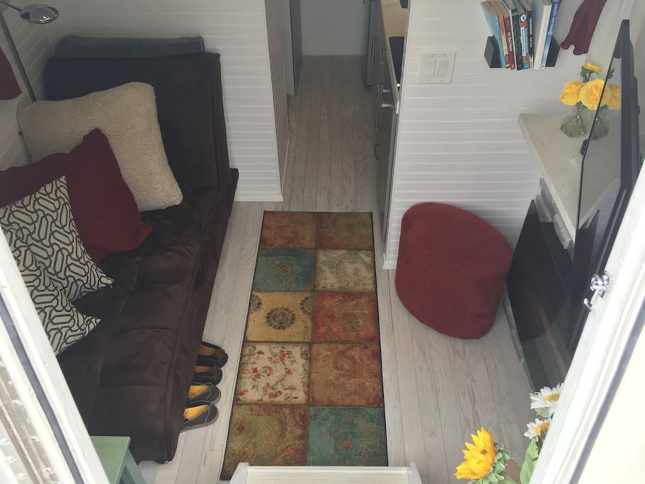 Cozy parlor with a chaise lounge that folds down into a single bed