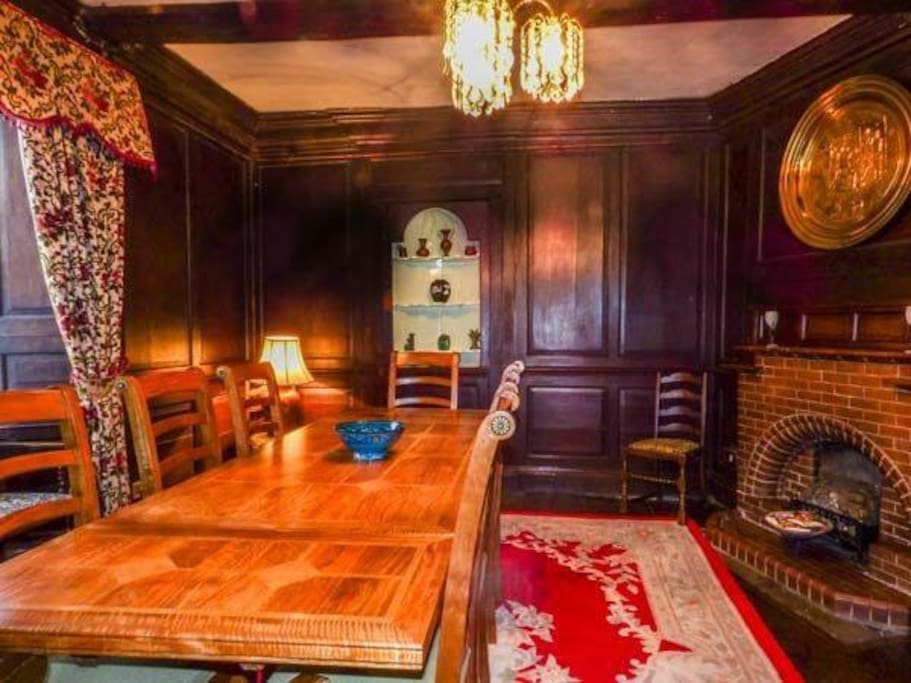 Formal 17th century panelled dining room.