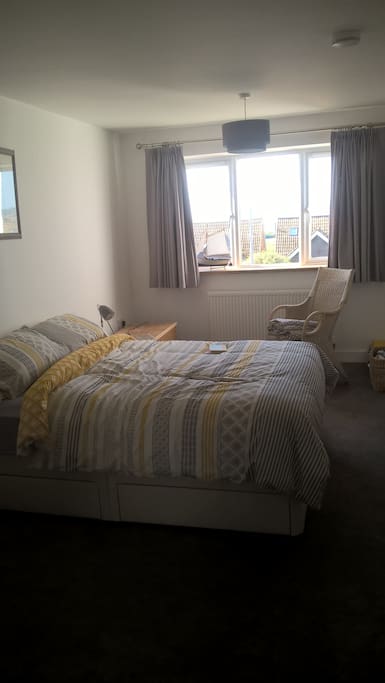 Large bedroom with view across the bay to Portland