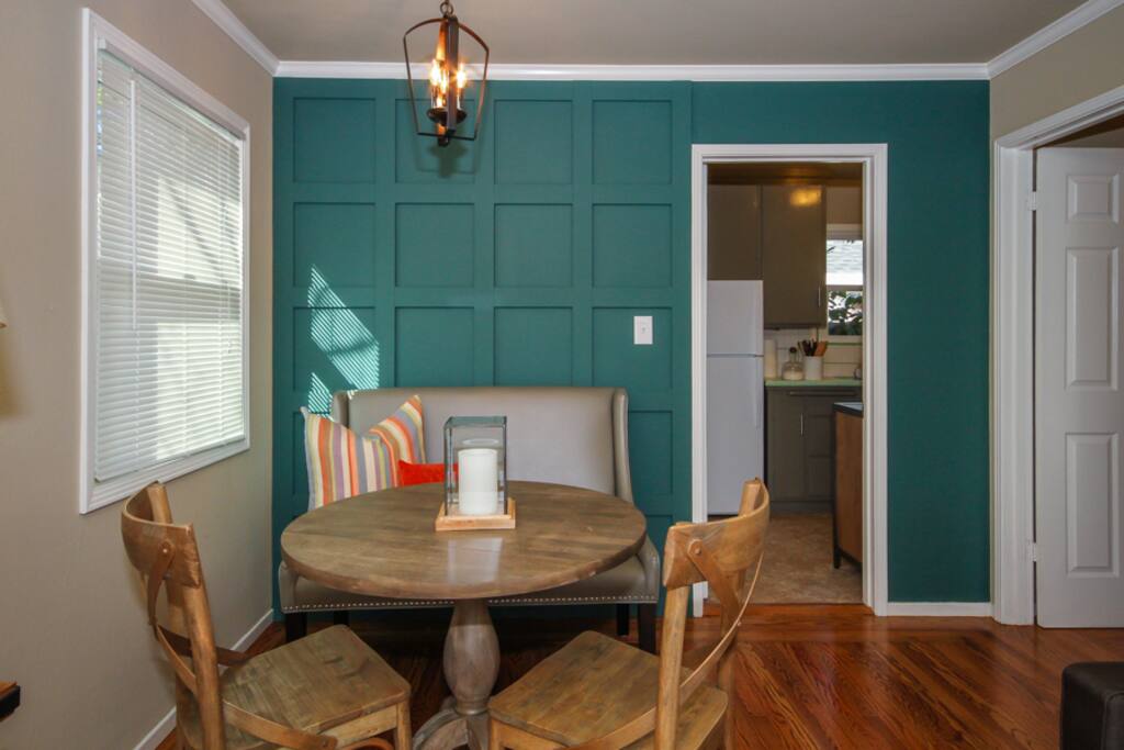 Dine-in area perfect for enjoying a meal or for working. Outlet located below bench seat for convenient computer/phone use.
