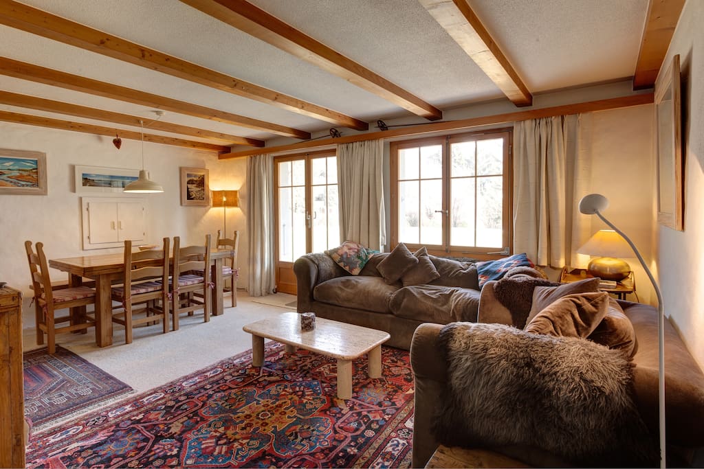 Sitting /dinning room with doors onto terrace.