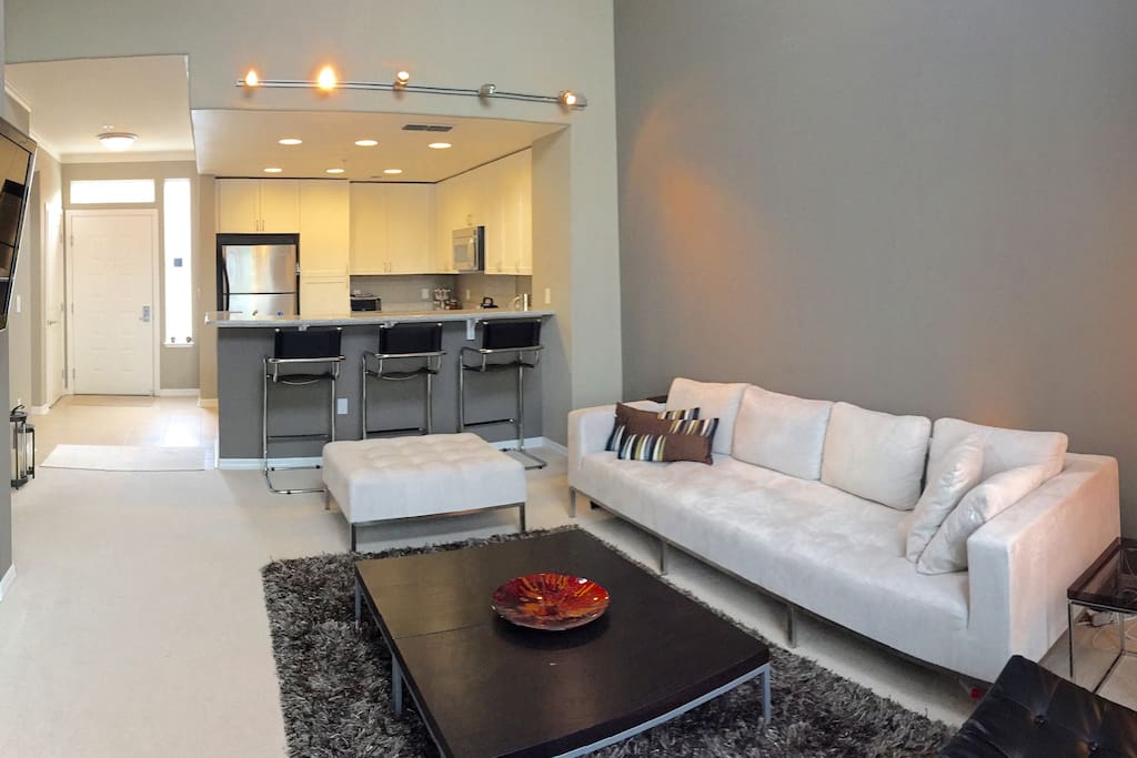 full kitchen with oven, stove, toaster oven, microwave