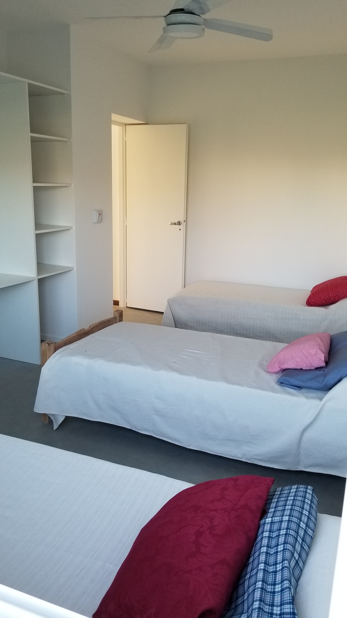 SECONDARY BEDROOM with 3 separate beds