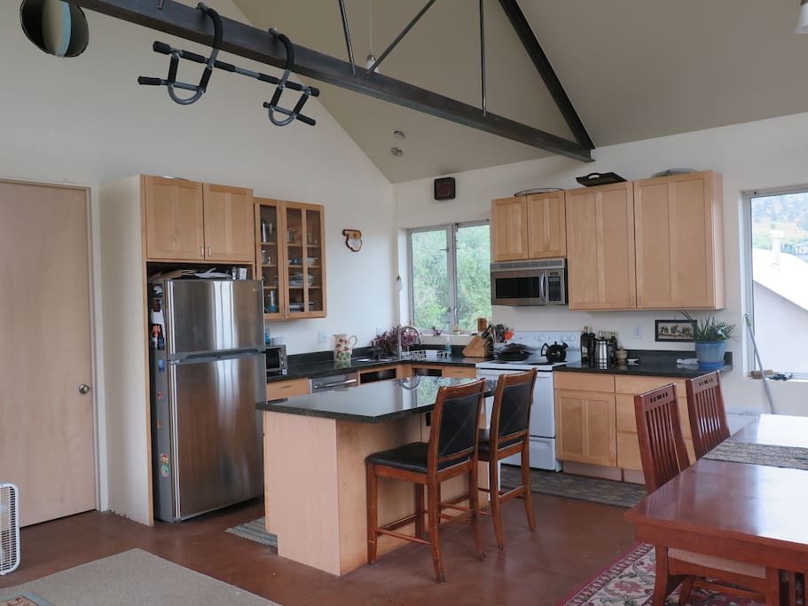 Kitchen with vaulted ceilings off the great room.