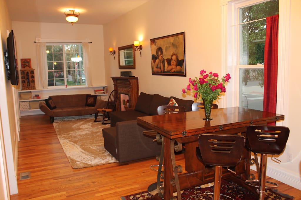 Comfortable living room and dining room table that seats 8.