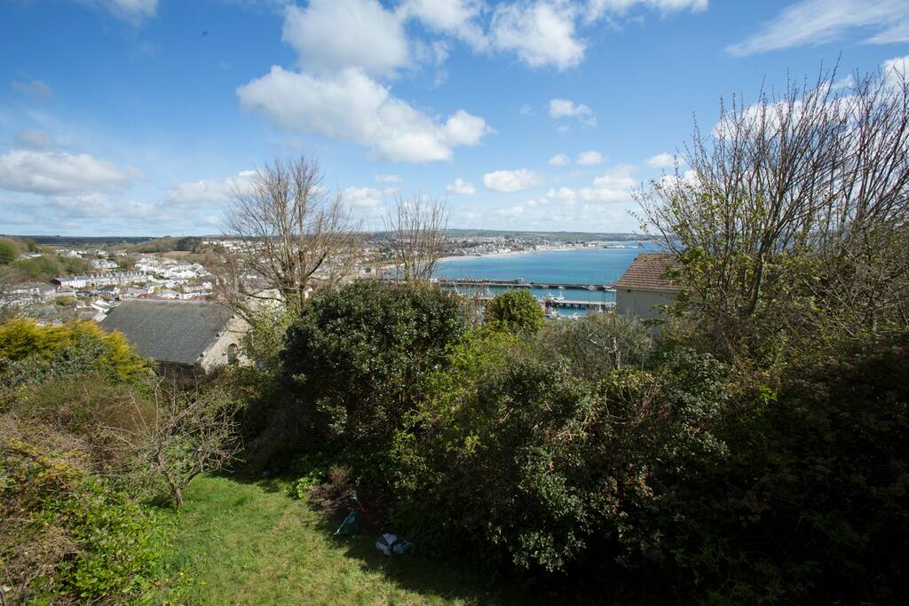 Balcony views over the garden and harbour are wonderful.