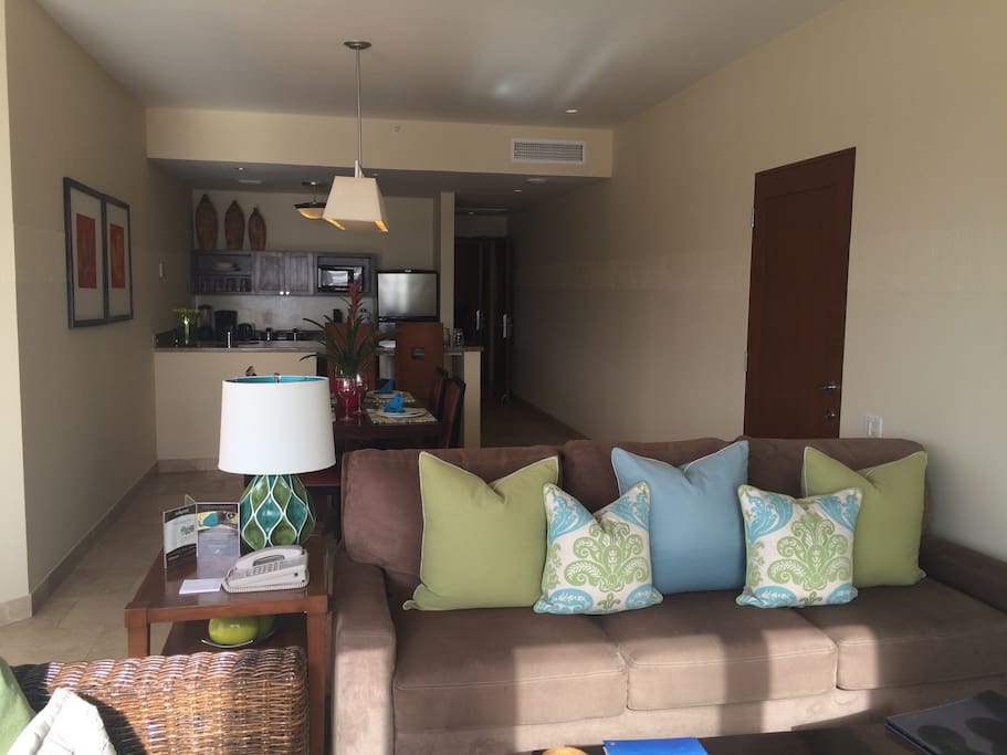 TV room and living room with sleeper sofa
Full-size equipped kitchen
Private bedrooms with king bed and LCD cable TV