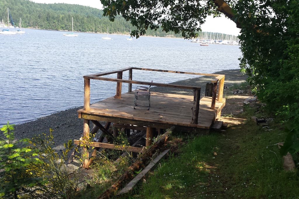 A deck down on the beach to watch the sunrise or sunset, this is a shared deck with the house.