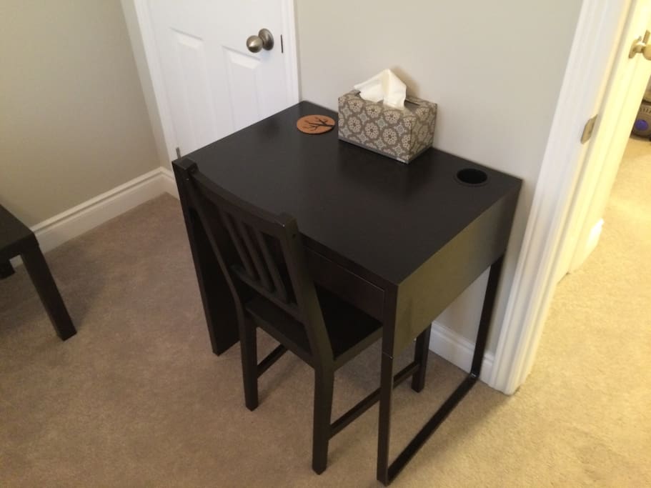 Desk with an outlet below and drawer. Free super fast wifi if you need to stream, download, etc.