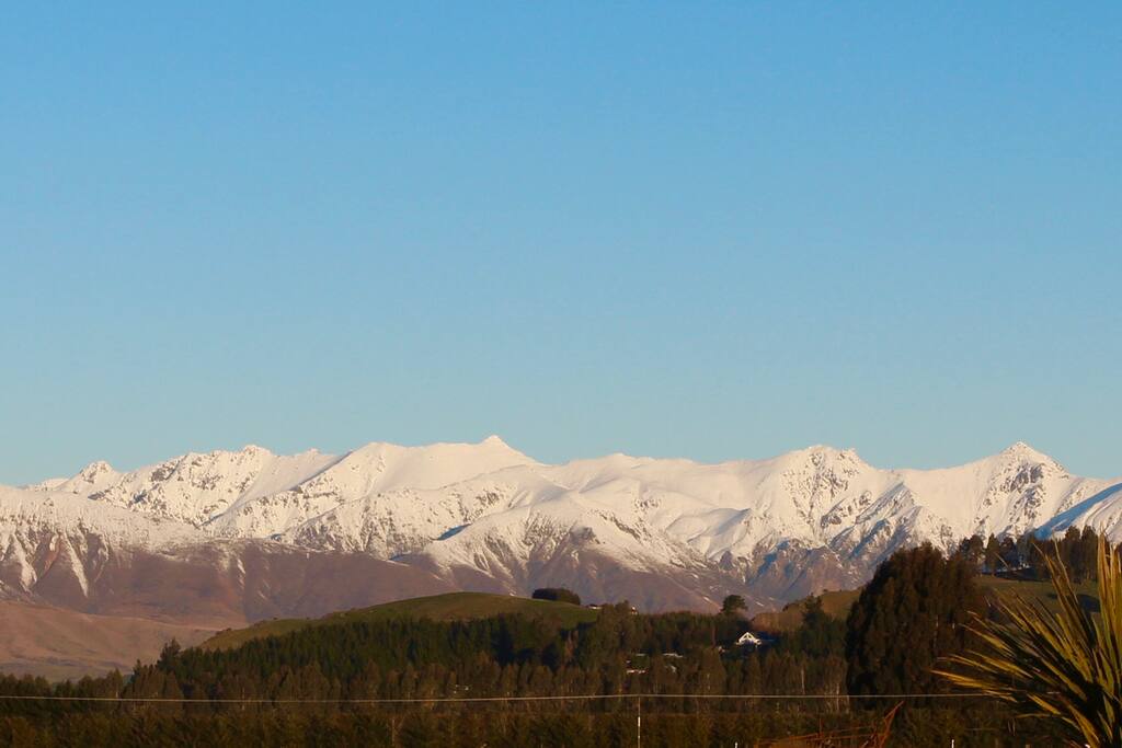 Freestone Hill- the little white A-frame is our home and your cabins below!