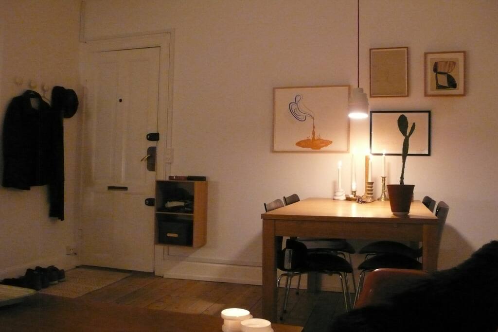 View of dining area in the living room. To the left you see the entrance door.