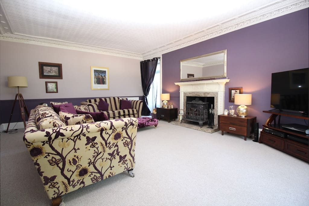 Main Sitting Room with Full Sky TV Package and Wood Burning Stove