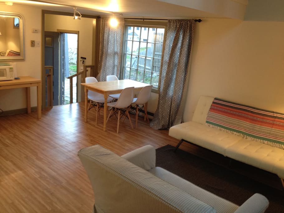 Main living space and dining area overlooking courtyard
