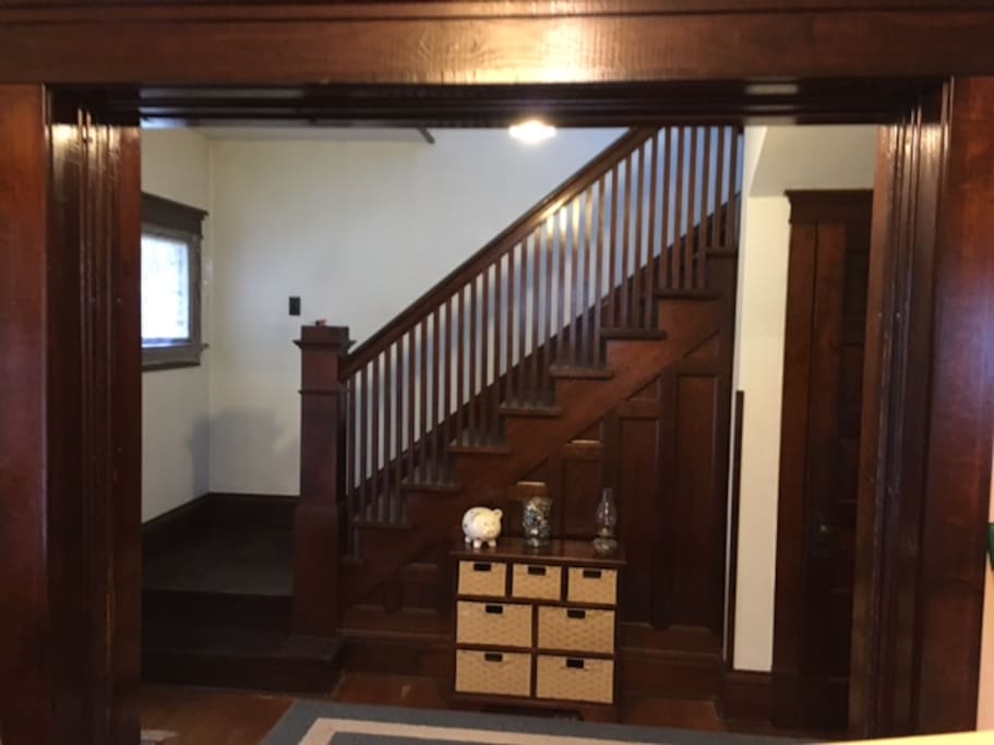 The entryway and stairs going up to the bedroom.