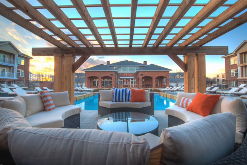 Resort-style pool and sundeck with cabanas
