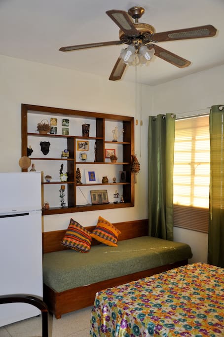 The bedroom has a fridge, a Safe and additional personal bed.