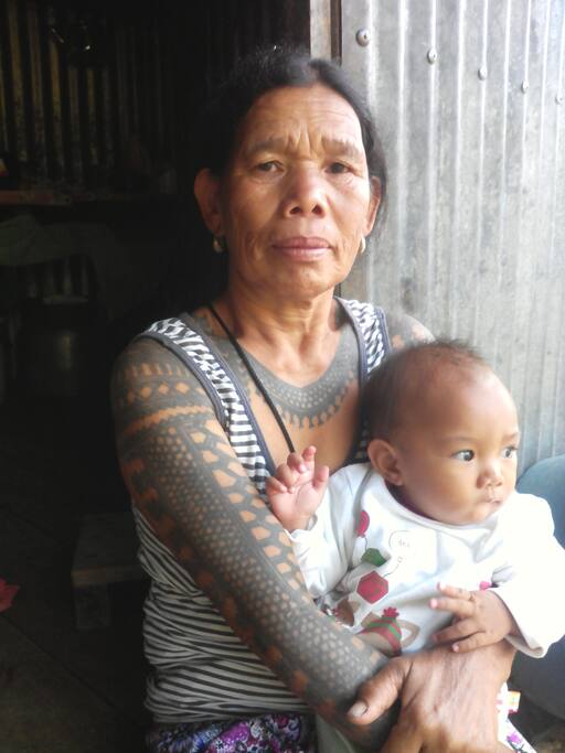 The tattoo village woman with baby