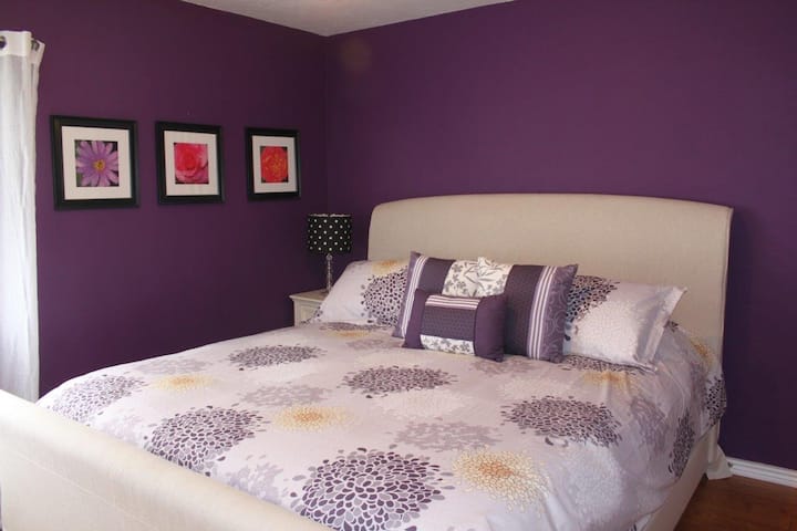 Luxury mattresses, pillows and bedding. Upstairs bedroom with king-sized bed.