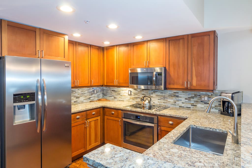 Cook up a delicious dinner in the spacious kitchen with stainless steel appliances and gorgeous countertops.