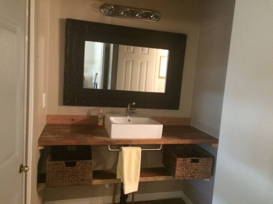 Sink area outside master bathroom .