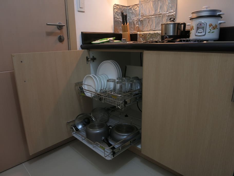 Complete with tableware, cutlery, glasses, cups, pots and pans.