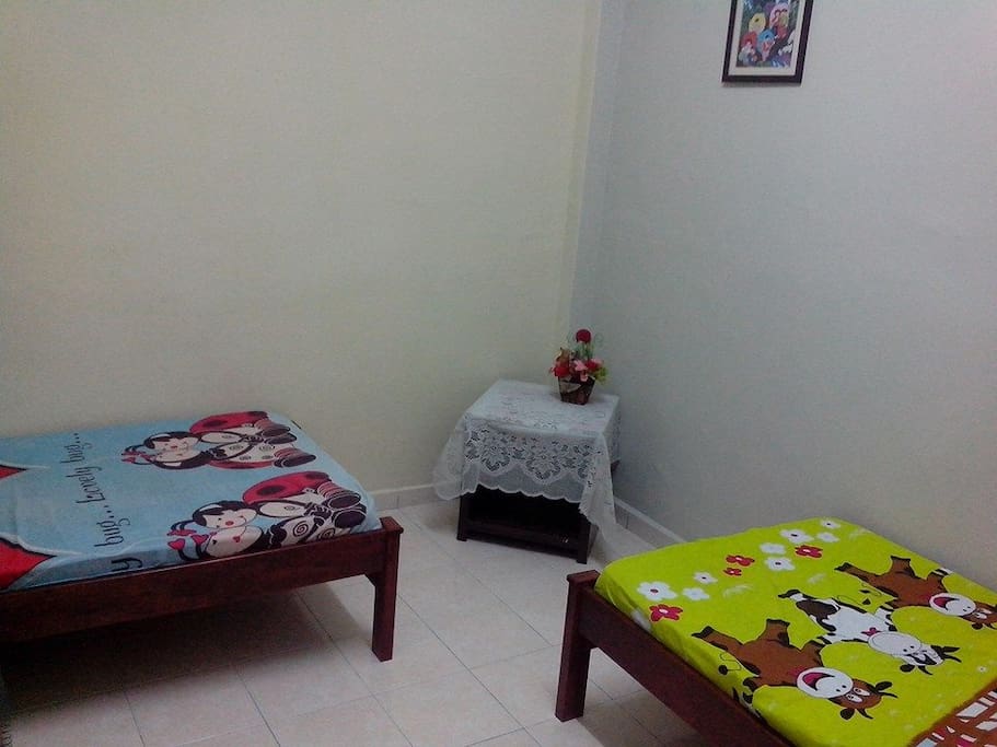 2nd room with two single beds
