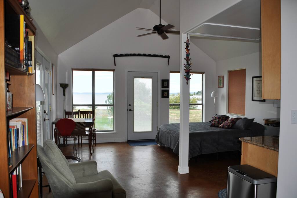 The front living/sleeping area offers generous views of the lake.