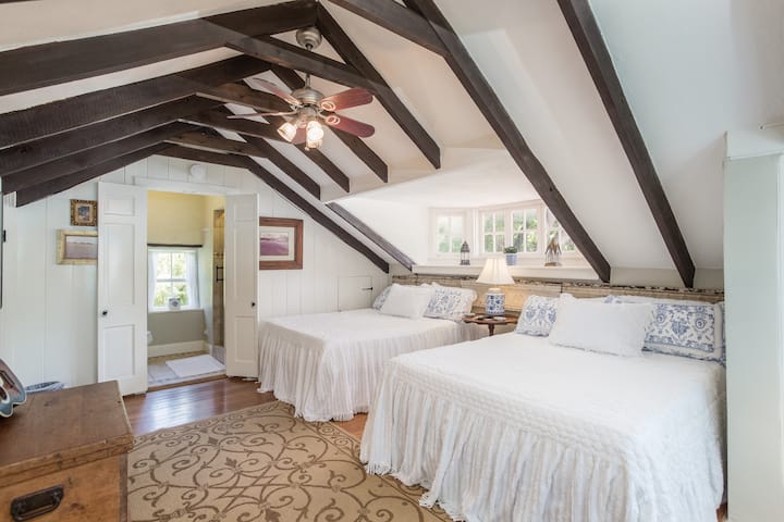 Upstairs bedroom has private full bath, 2 Queen beds and a TV. Stairs are steep so not for use by elderly or small children.